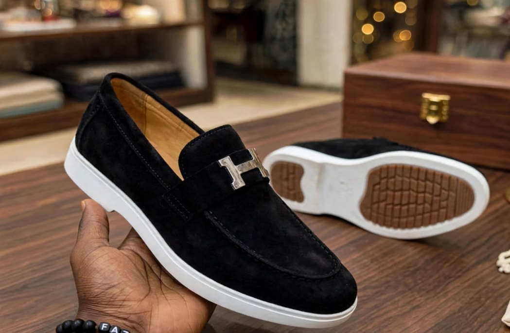 Black suede slip-on loafers