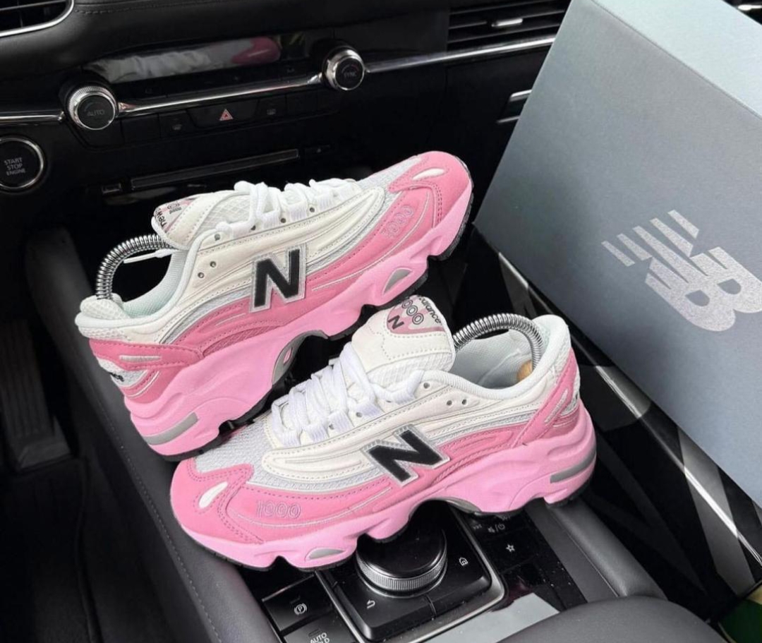 New Balance 1000 chunky Y2K-style retro running sneakers in a white and pink colorway
