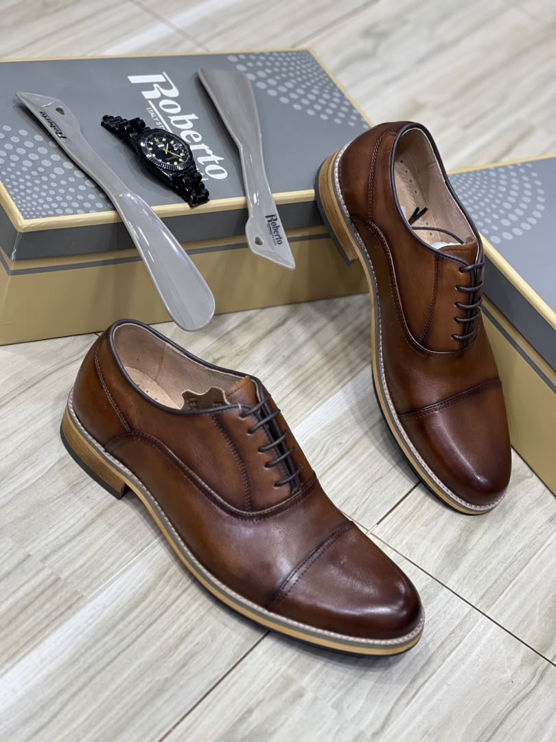 Lace-up oxford dress shoes.
